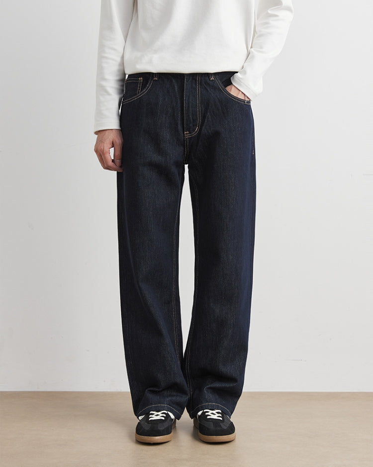 بنطلون جينز واسع الساقين نيلي داكن اللون النيلي