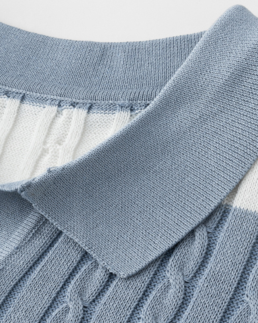 Polo rayé en maille torsadée