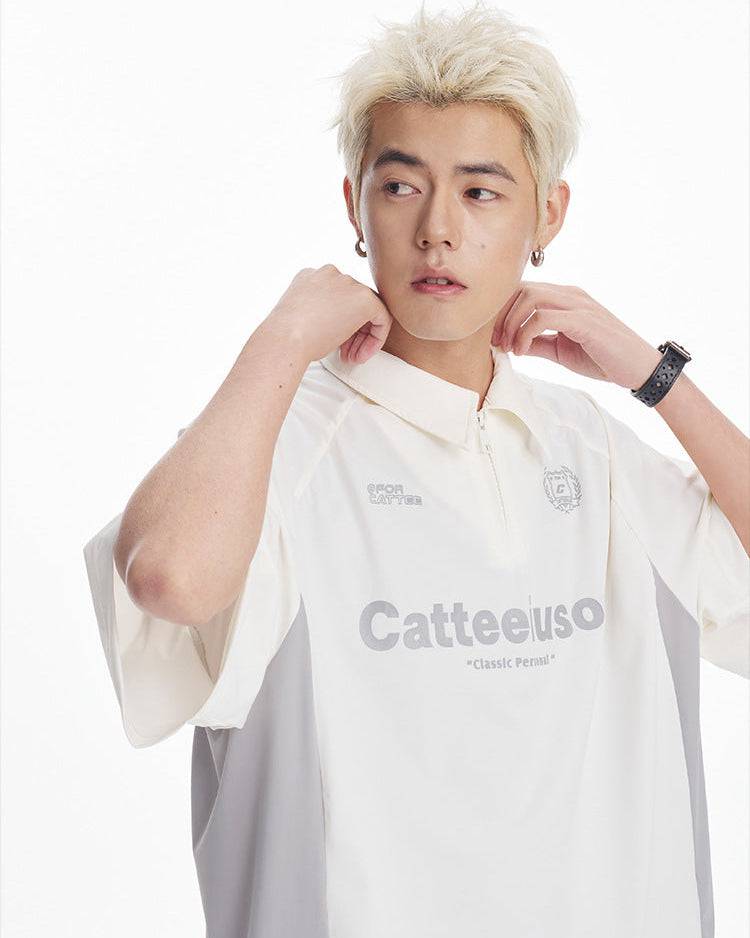 The Contour Knit Quarter-Zip Polo