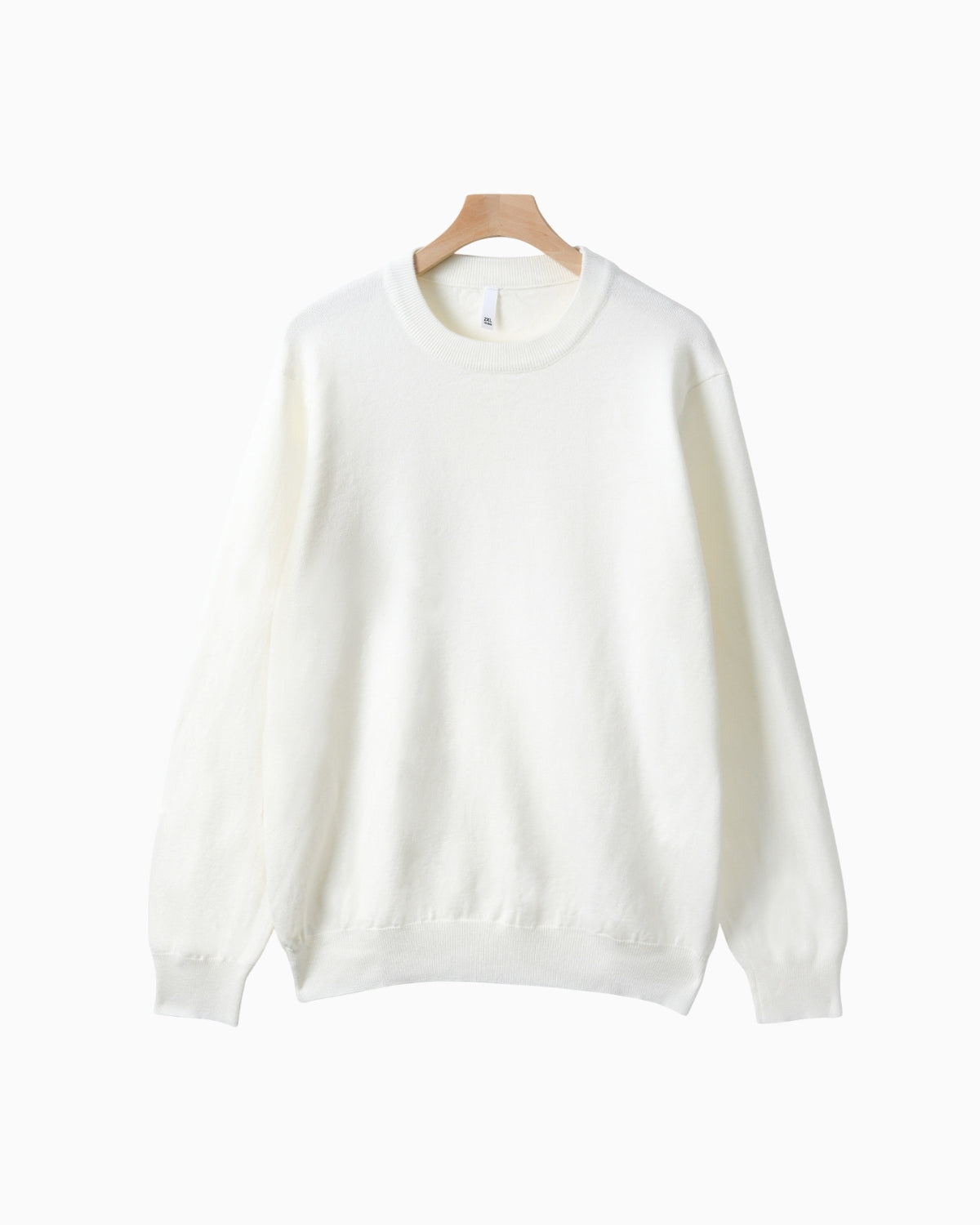 Strikket sweater med rund hals i merinouldblanding