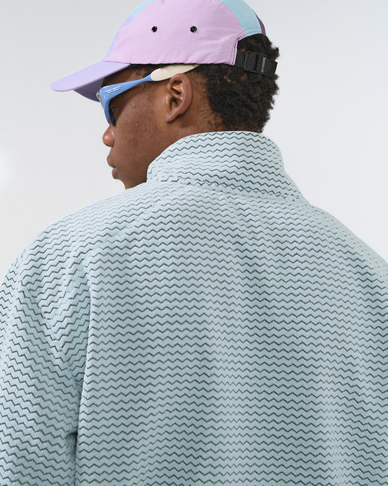 Die Jacke mit Waffelmuster und Reißverschluss