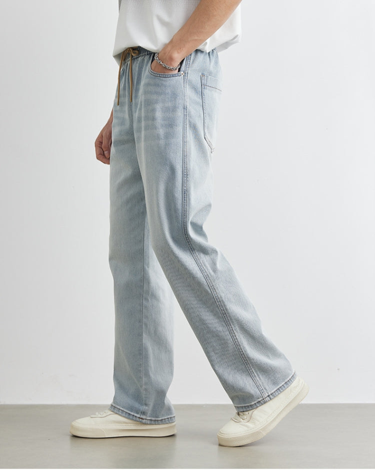 Vaqueros con cordón y cintura elástica en lavado claro