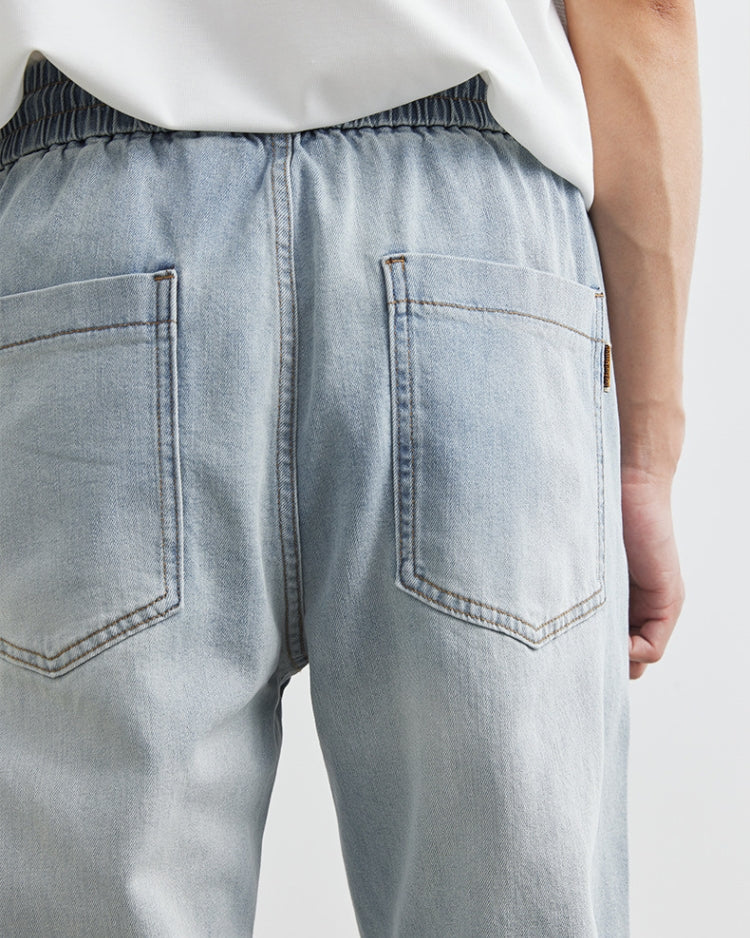 Vaqueros con cordón y cintura elástica en lavado claro