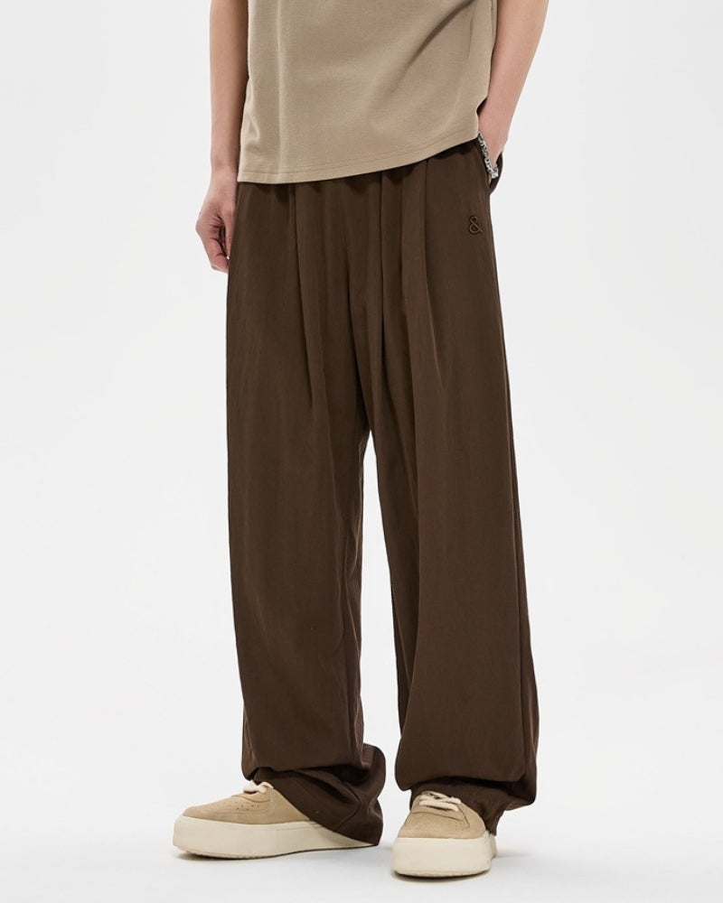 Pantalones relax bordados y de pernera ancha