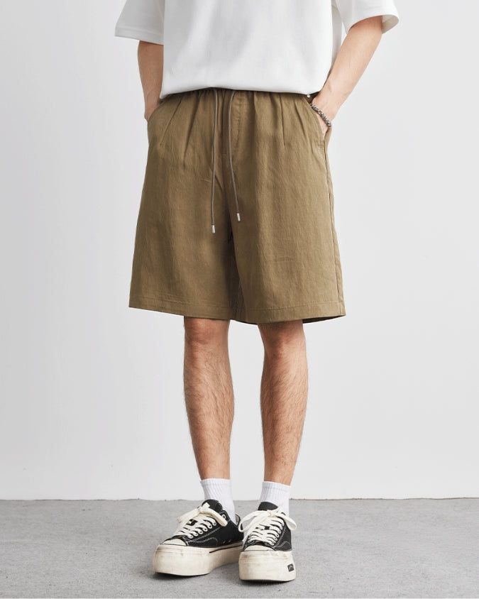 Pantalones cortos anchos relajados de lino con cordones