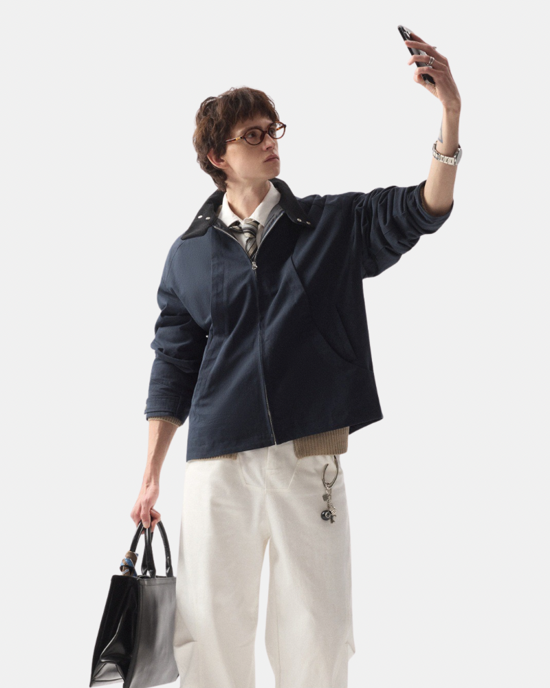 Chaqueta con cremallera y cuello alto