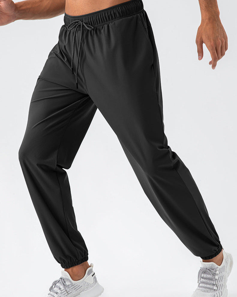 Pantalones deportivos elásticos de nylon Cool Loose de secado rápido
