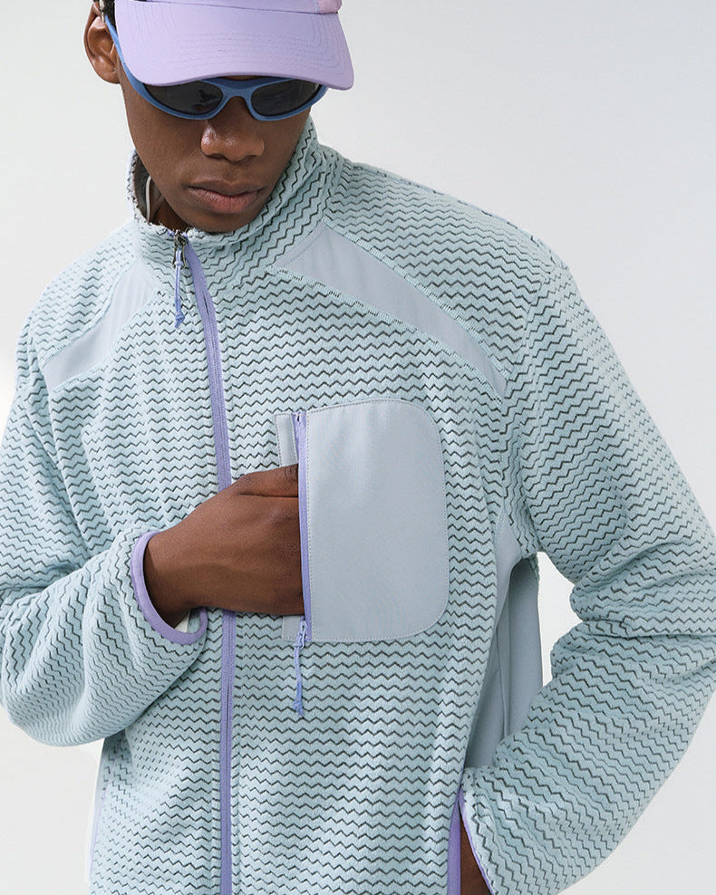 La veste zippée à motif gaufré