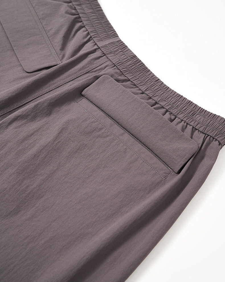 Pantalon technique à cordon de serrage à jambes larges