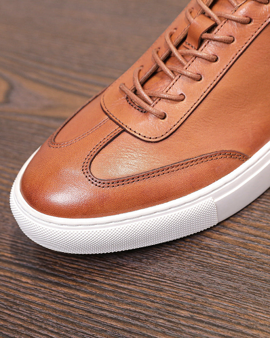 Baskets basses en cuir et daim avec semelle en gomme