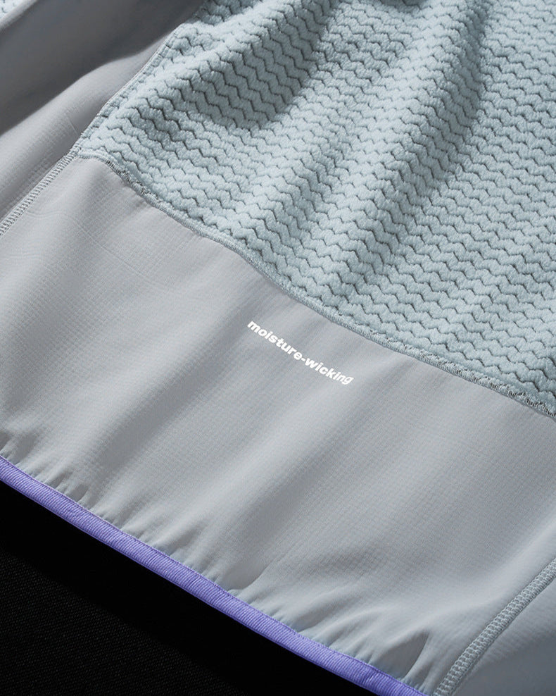 La veste zippée à motif gaufré