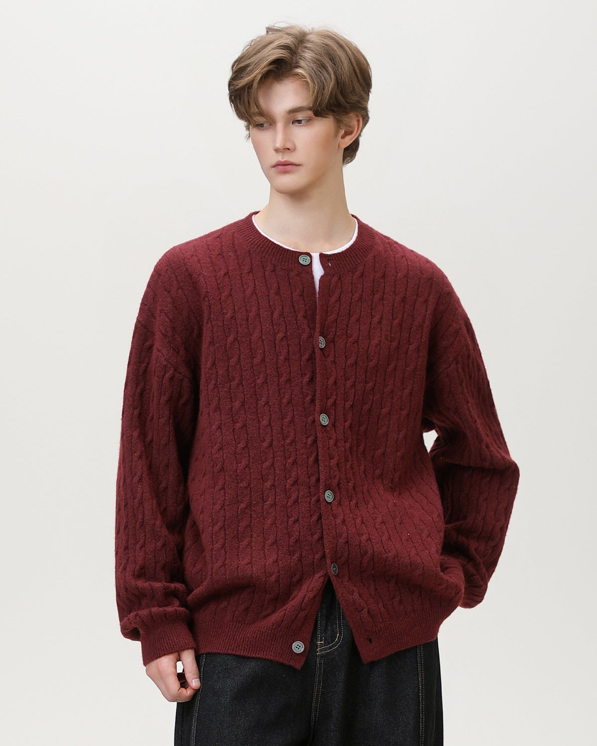 Cardigan con bottoni in maglia a cavo