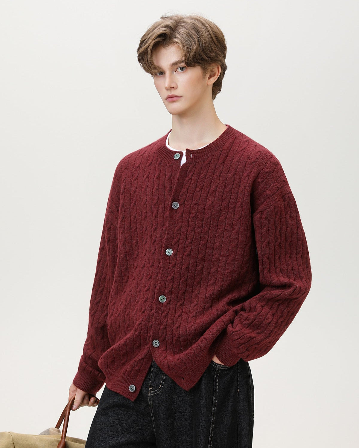 Cardigan con bottoni in maglia a cavo