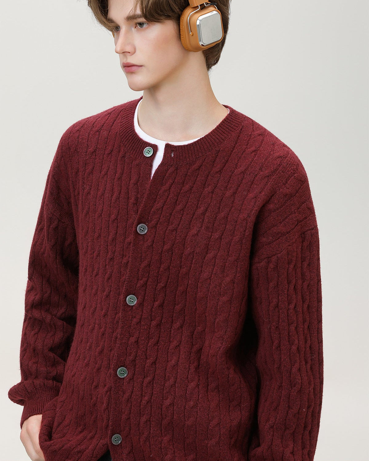 Cardigan con bottoni in maglia a cavo