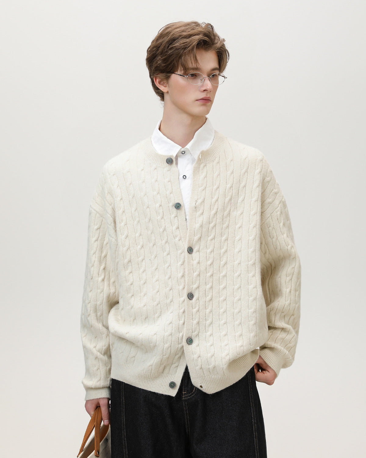 Cardigan con bottoni in maglia a cavo