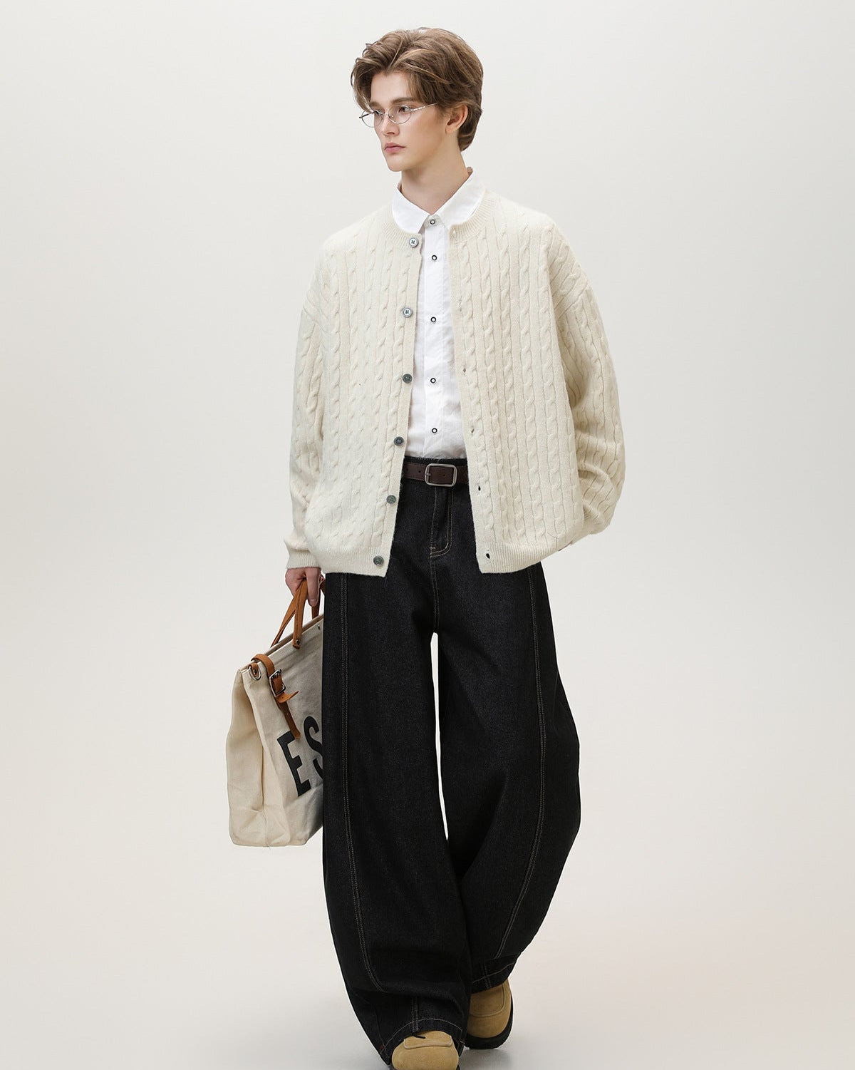 Cardigan con bottoni in maglia a cavo