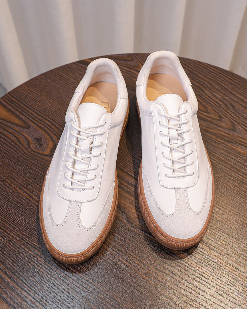 Lage sneakers van leer en suède met gomzool