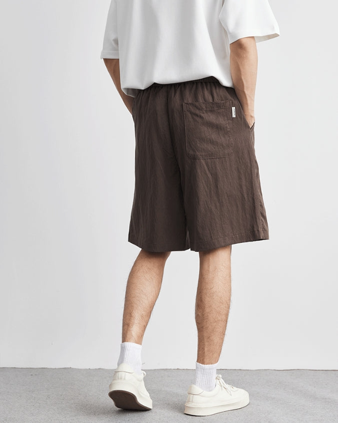 Shorts de linho largos e descontraídos com cordões