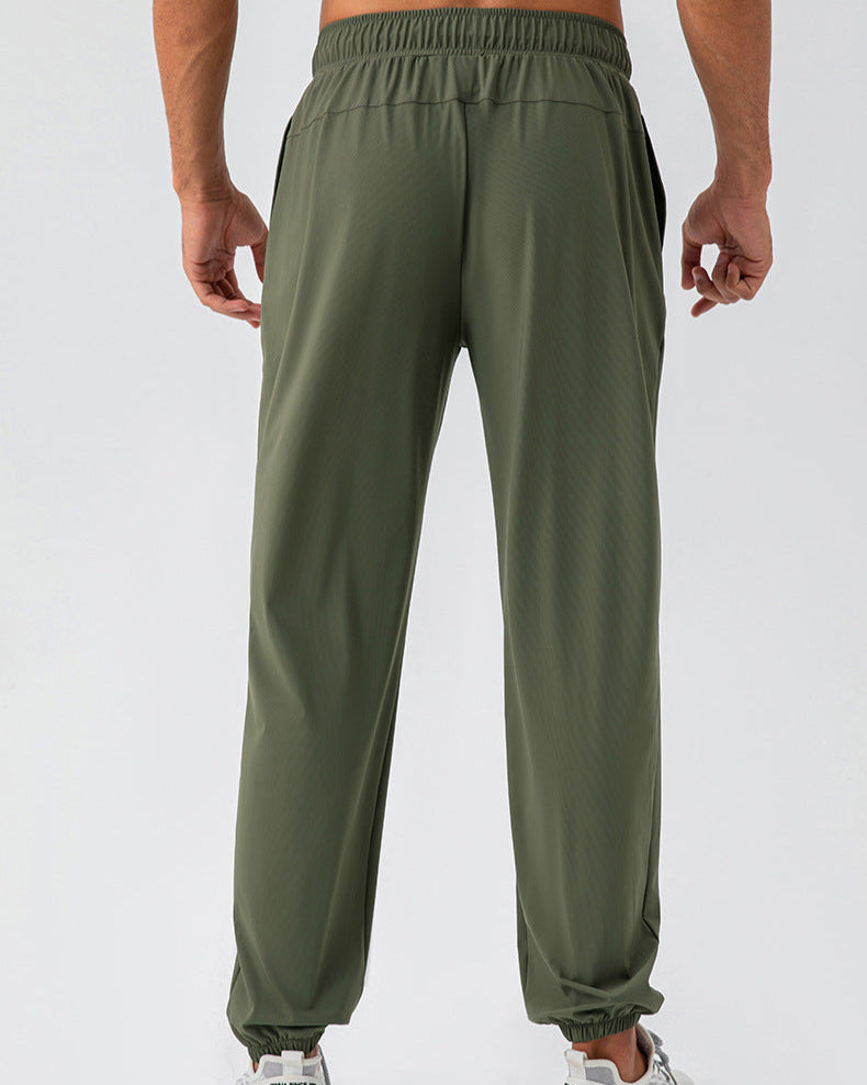 Calça esportiva elástica de nylon, solta e de secagem rápida