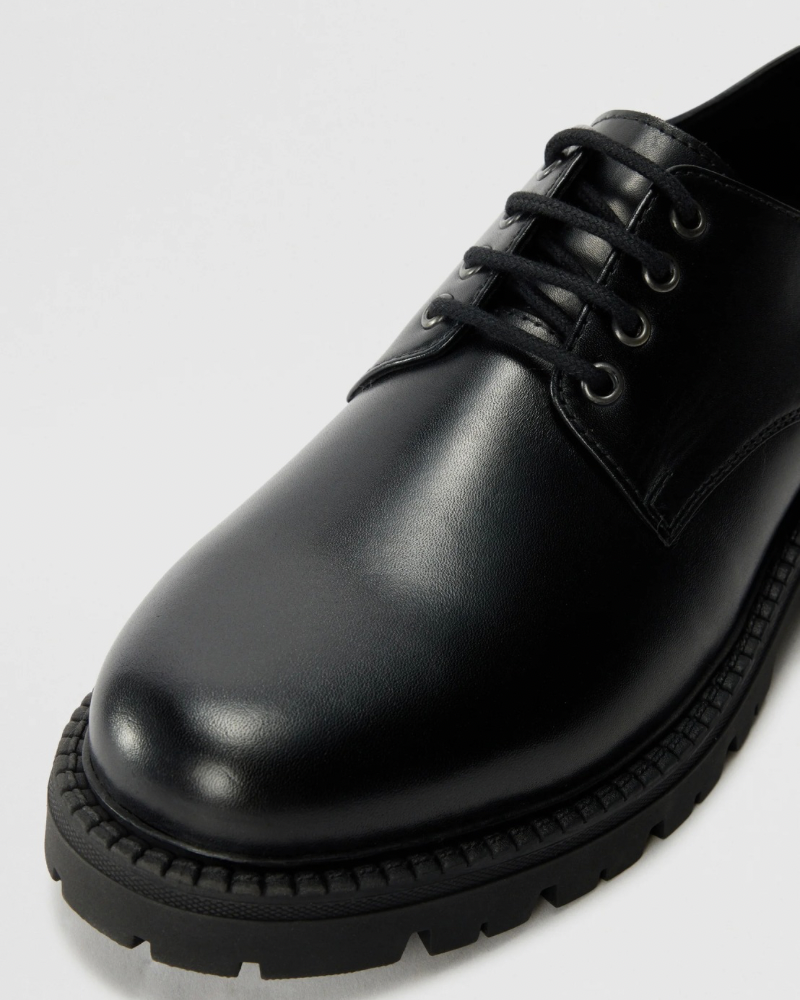 Botas clássicas com atacadores