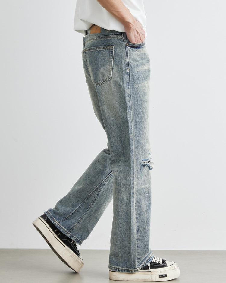 Distressed jeans med vida ben i denim