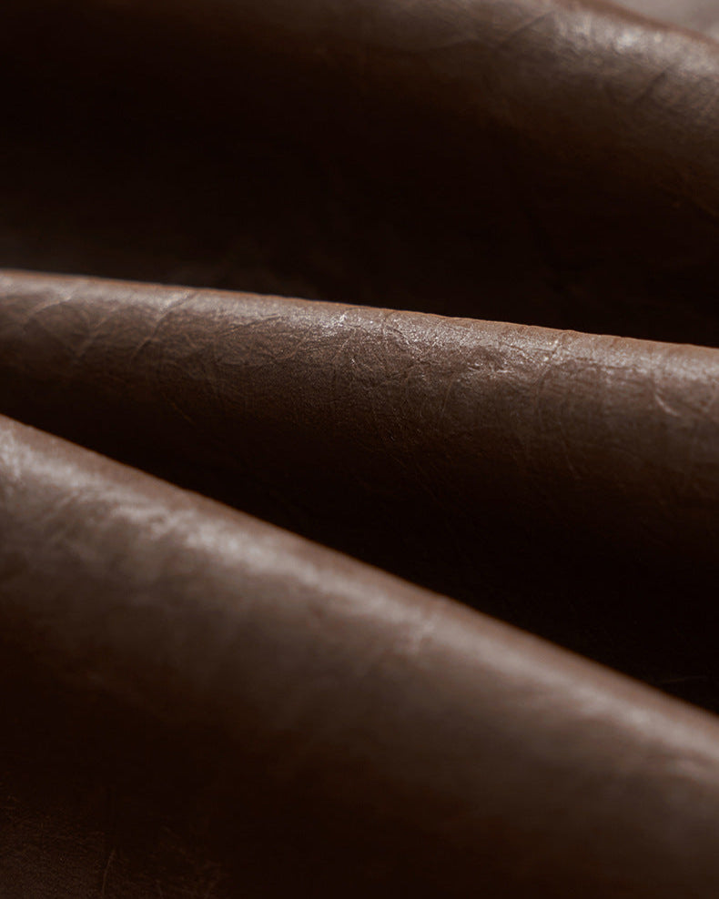 Zipjacka i konstläder med rynkeffekt