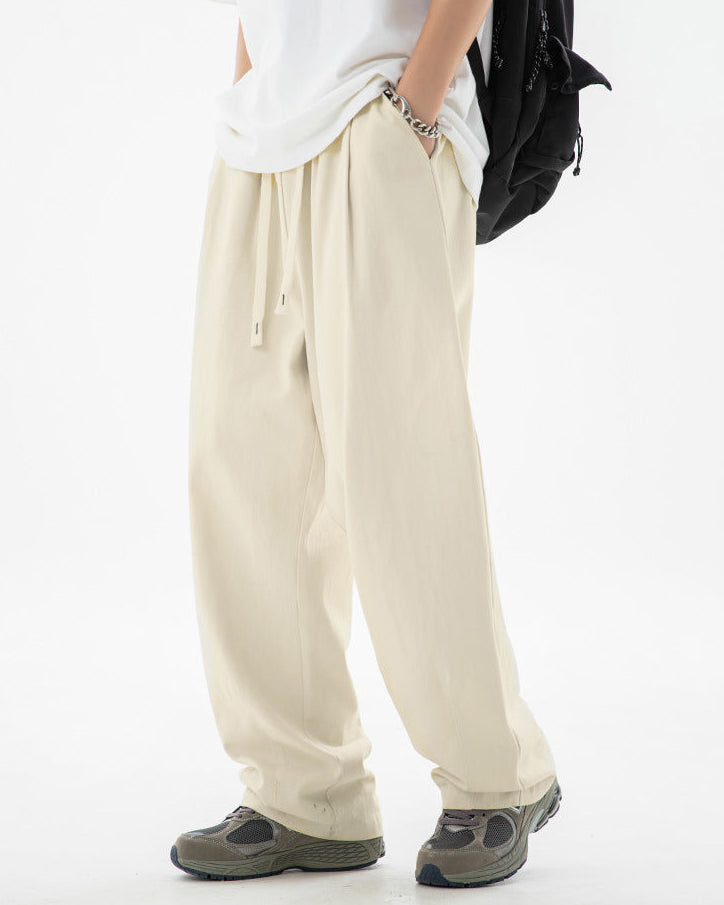 The Drift Pleated Cotton Trousers
