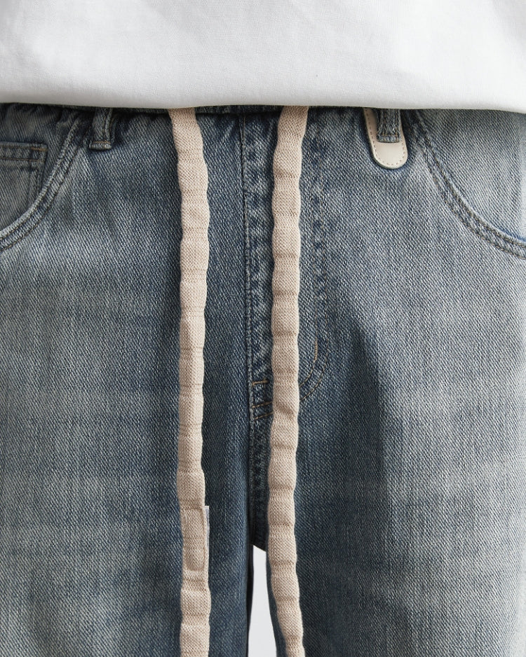 Verblasste große Schnürsenkel Straight Jeans