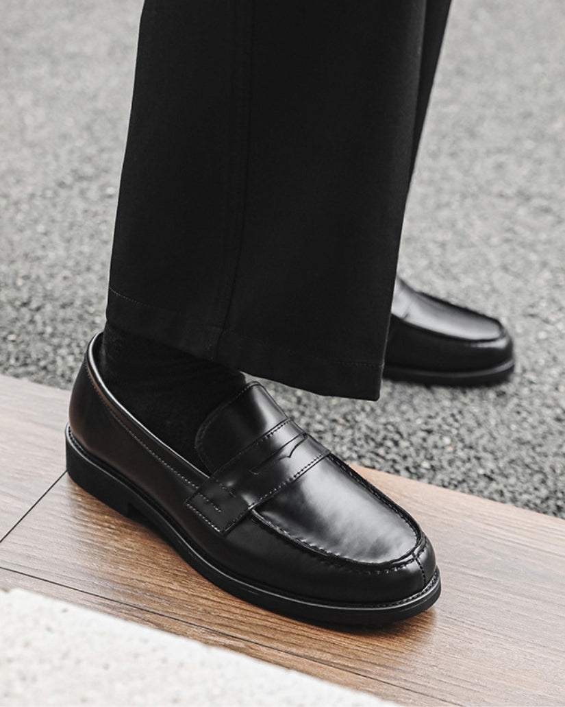 Schwarze Penny Loafers aus Leder