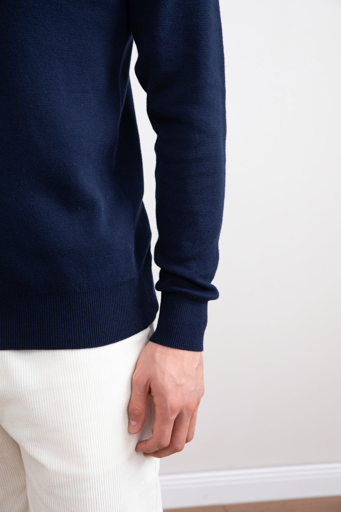 Blauwe open polo met lange mouwen