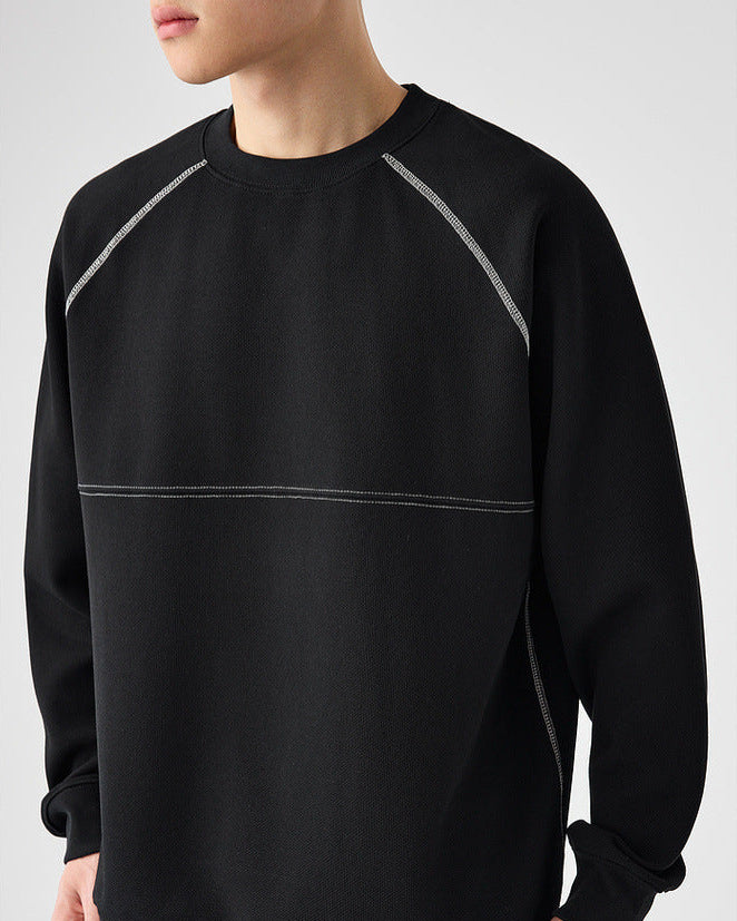 The Mo Maike 2025 Struktureret sweater med delt kontrast og rund hals
