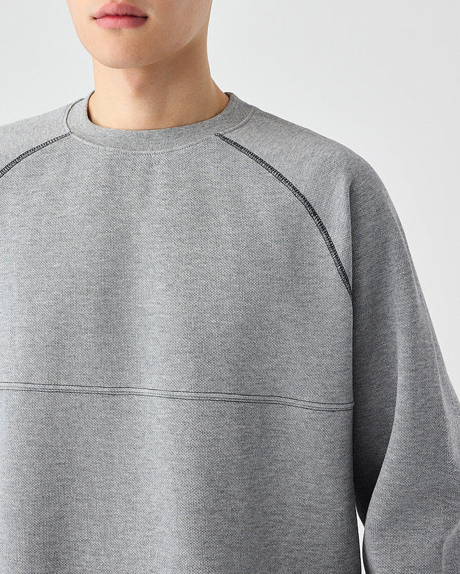 The Mo Maike 2025 Strukturierter Pullover mit geteiltem Kontrast und Rundhalsausschnitt