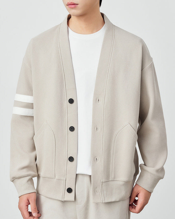 Gestreifte Strickjacke mit Twilltextur und Kontrast