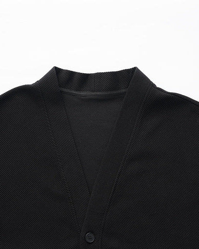 Gestreifte Strickjacke mit Twilltextur und Kontrast