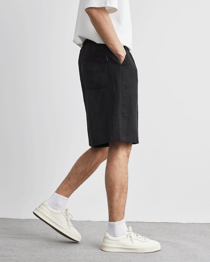 Pantalones cortos anchos relajados de lino con cordones