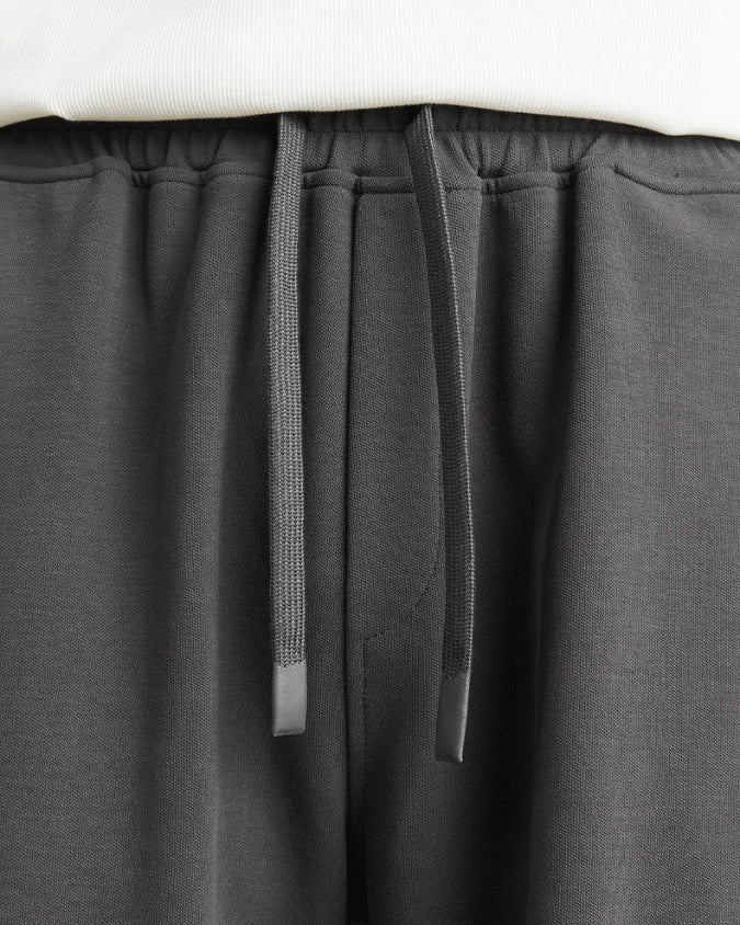 Pantalón corto ancho relajado con cordones