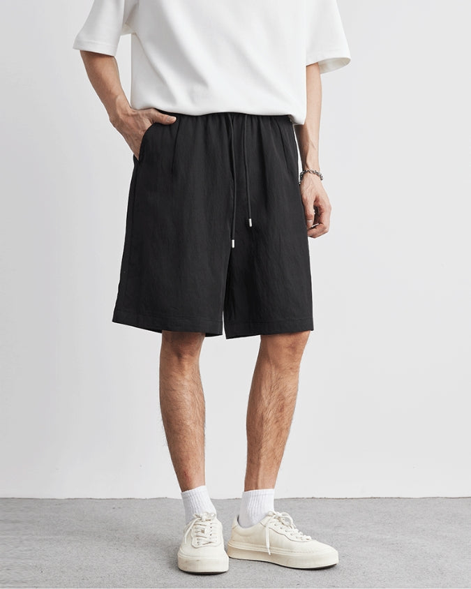 Pantalones cortos anchos relajados de lino con cordones