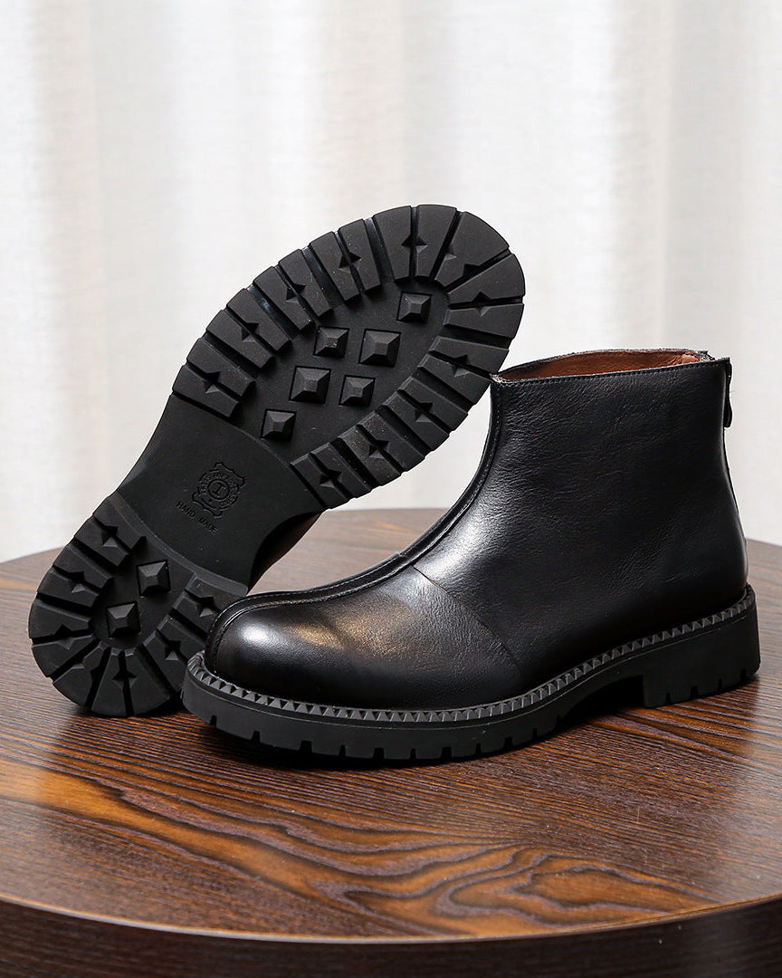 Les bottes en cuir robustes à fermeture éclair