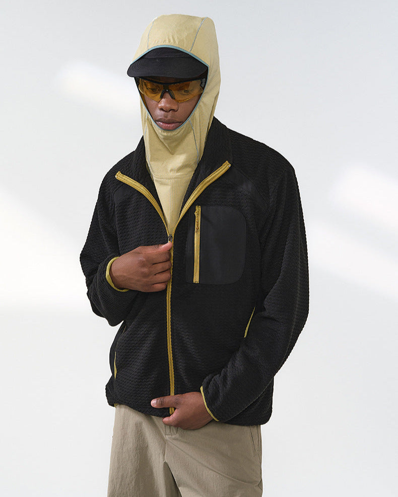 La veste zippée à motif gaufré