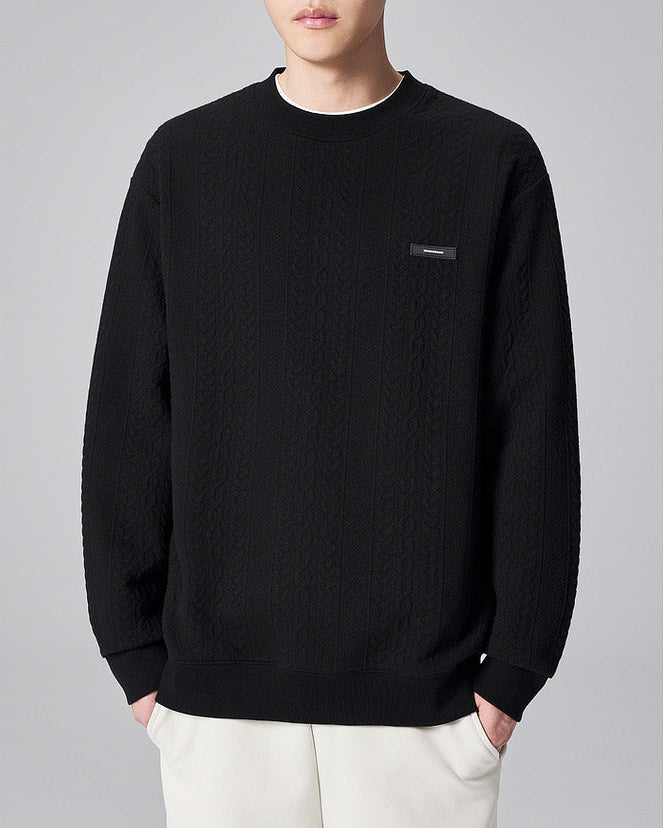 Maglione in maglia a cavi con trama testurizzata