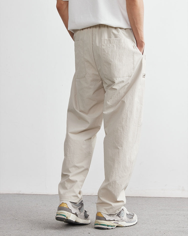 Pantaloni lounge Drift con cintura a pieghe