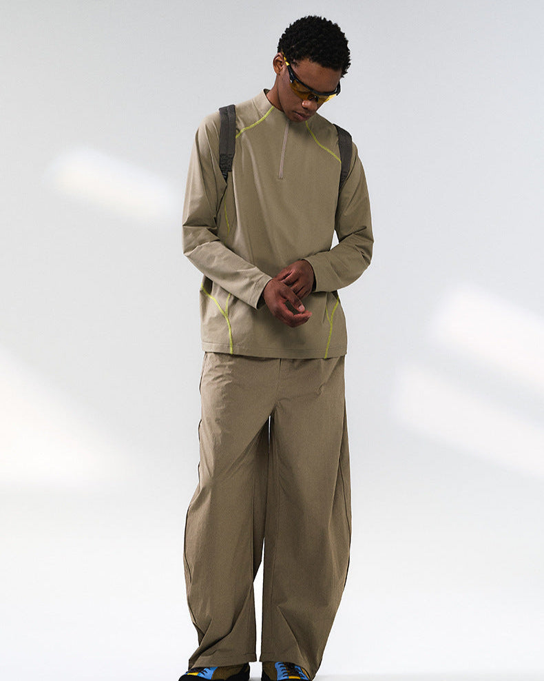 Pantaloni tecnici a gamba larga con coulisse