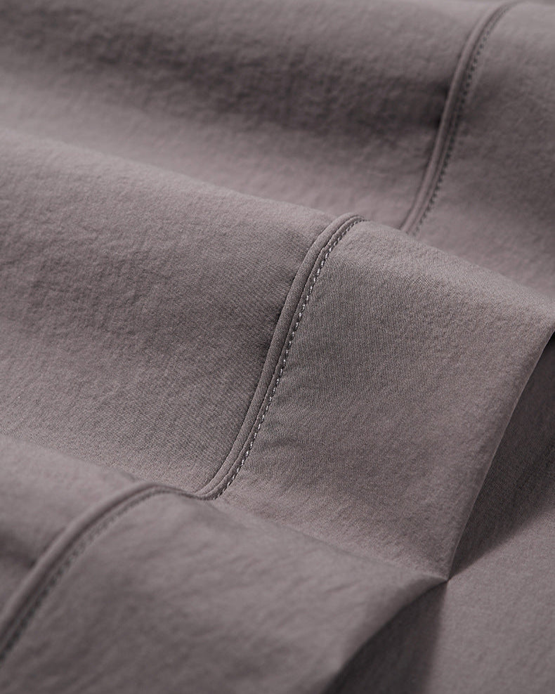 Pantaloni tecnici a gamba larga con coulisse