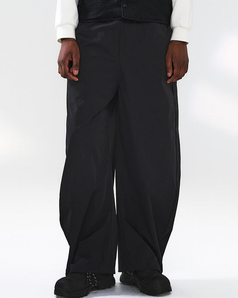 Pantaloni tecnici a gamba larga con coulisse