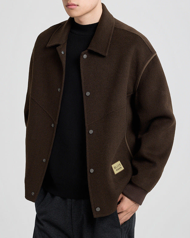 Callahan vendbar jakke i ullblandet tweed