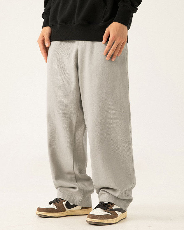 De gedrapeerde broek van Twill Ease