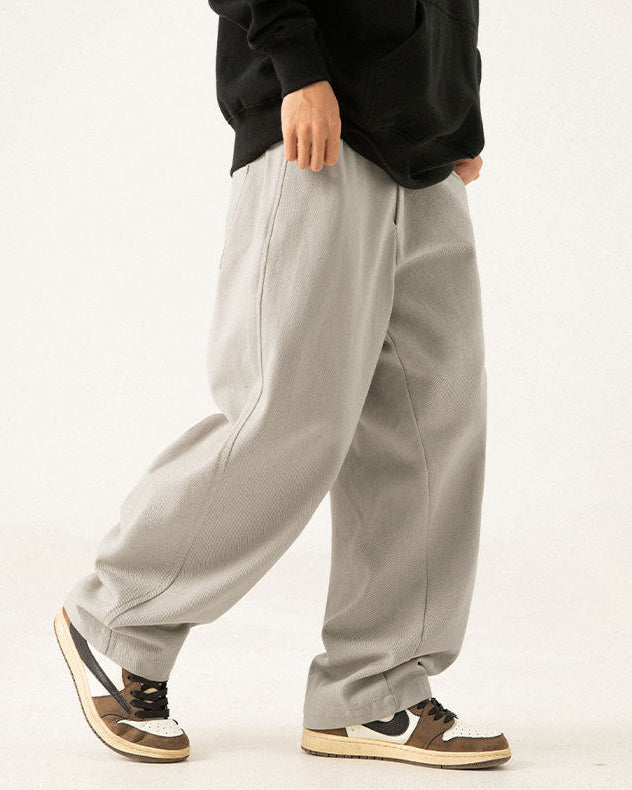 De gedrapeerde broek van Twill Ease