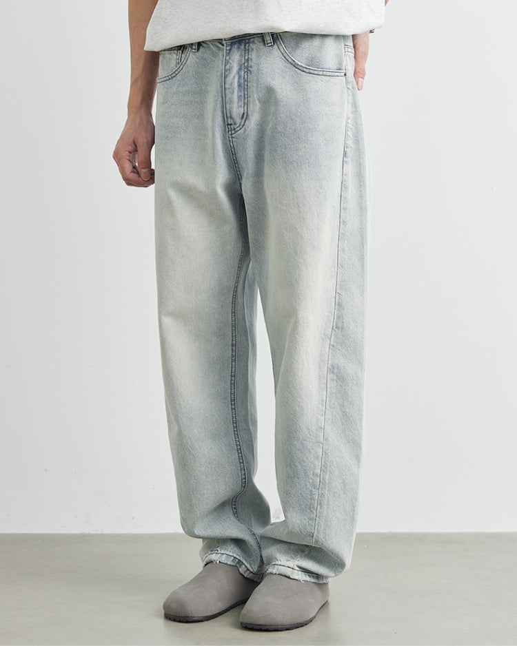Calça jeans baggy com logotipo bordado em lavagem clara