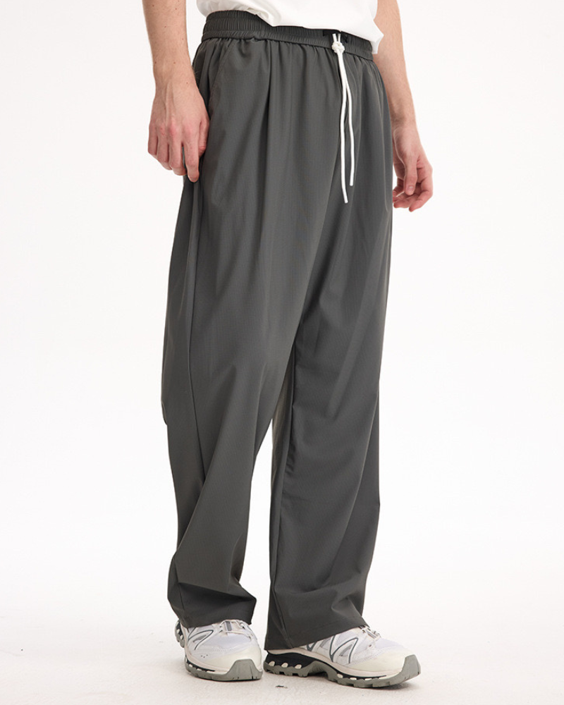 Calça de perna larga com cordão relaxado