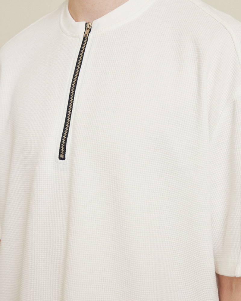 T-shirt com fecho de correr de grandes dimensões